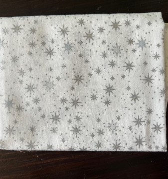 Hvit med små sølv stjerner